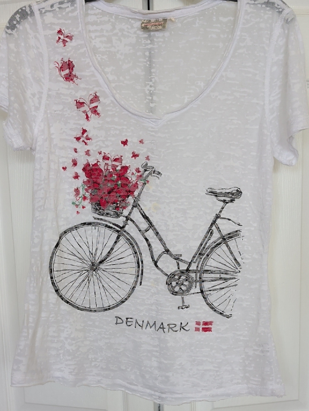 Women's White V-Neck Bicycle Graphic Tee with Pink Accents